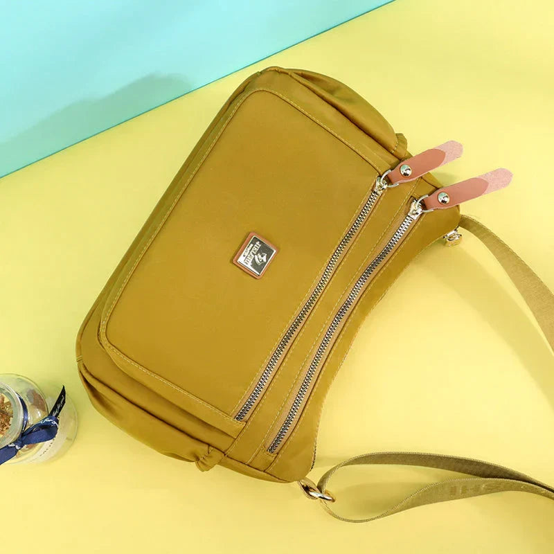 Shoulder strap bag with multiple compartments